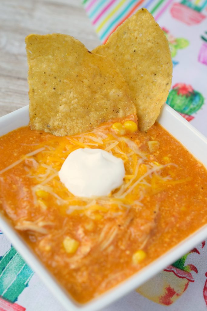 Slow Cooker Chicken Enchilada Soup is a wonderful meal! Incorporating all the delicious flavors of the Mexican dish with the ease of crockpot preparation.