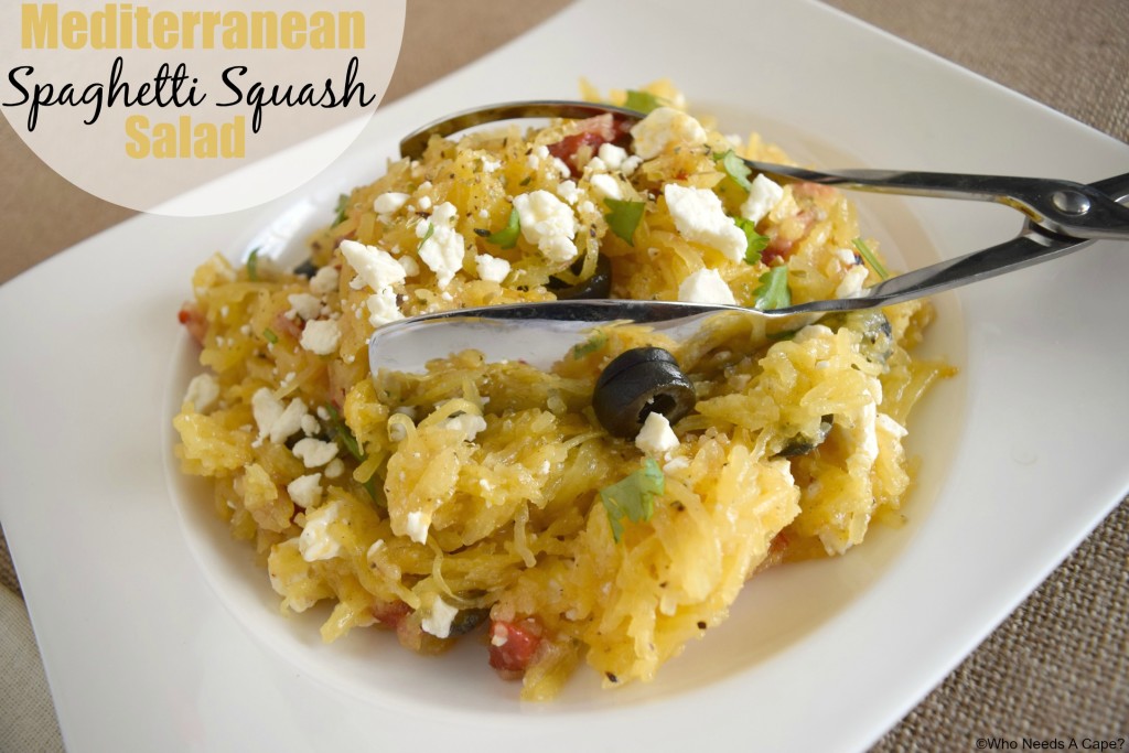 Mediterranean Spaghetti Squash Salad on a white plate with tongs.