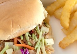 Make these deliciously easy Apple Bourbon Pulled Pork Sliders with Slaw! Perfect for game day spreads or for an easy meal anytime. You'll love them!