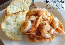 Wonderful flavors blend together in this simple Shrimp Feta Pasta Bake. Sauce, pasta, shrimp, cheese all baked together with a crunch topping. So yummy!
