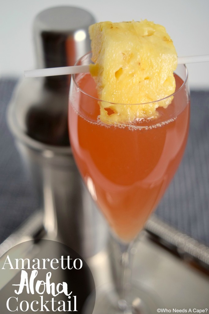 The Amaretto Aloha Cocktail sweeps you away to the tropics! A simple beverage to make, make a pitcher for your next party!