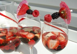 Berry Sangria is the perfect summer sipping cocktail - make it by the pitcher and you can serve it all night! Great for parties too!