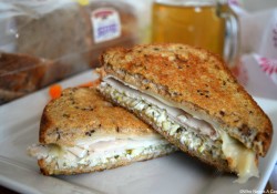 Whether for lunch or dinner you'll love the flavors found within this Grilled Turkey Pesto and Swiss Sandwich. A wonderful meal with little prep work.