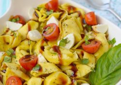 All of my favorite flavors in one delicious side dish! Tortellini Caprese Salad is super easy to prepare and perfect for summer dining.