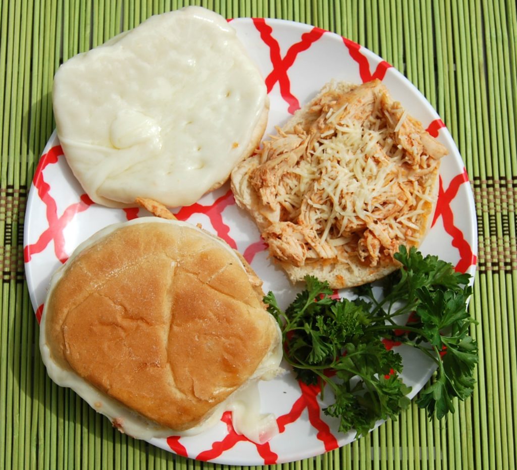 Slow Cooker Pulled Chicken Parmesan is a fantastic meal. It's quick to put together, comfort food in taste. Your whole family will love it!