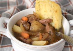 Slow Cooker Pot Roast Soup has tender beef, loads of carrots and potatoes and caramelized onions! Perfect with some crusty bread!