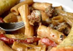 Rigatoni & Italian Sausage Skillet Meal is a hearty one pan dish that's easy enough for weeknights. Loaded with flavor you'll love this simple dish.