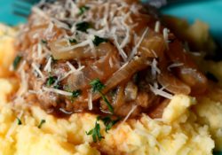 French Onion Salisbury Steak is a deliciously hearty meal that's easy enough for weeknights. Serve over mashed potatoes for the ultimate comfort meal.