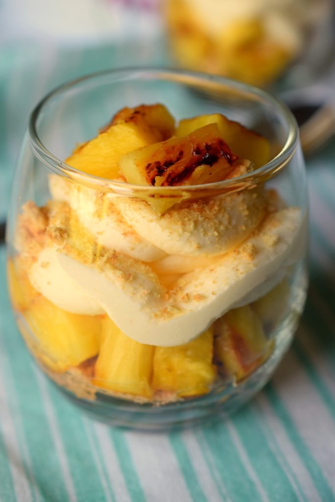 Grilled Pineapple Cheesecake Parfaits are the perfect summertime dessert! Sweet grilled pineapple is the star of this fantastic no-bake treat.