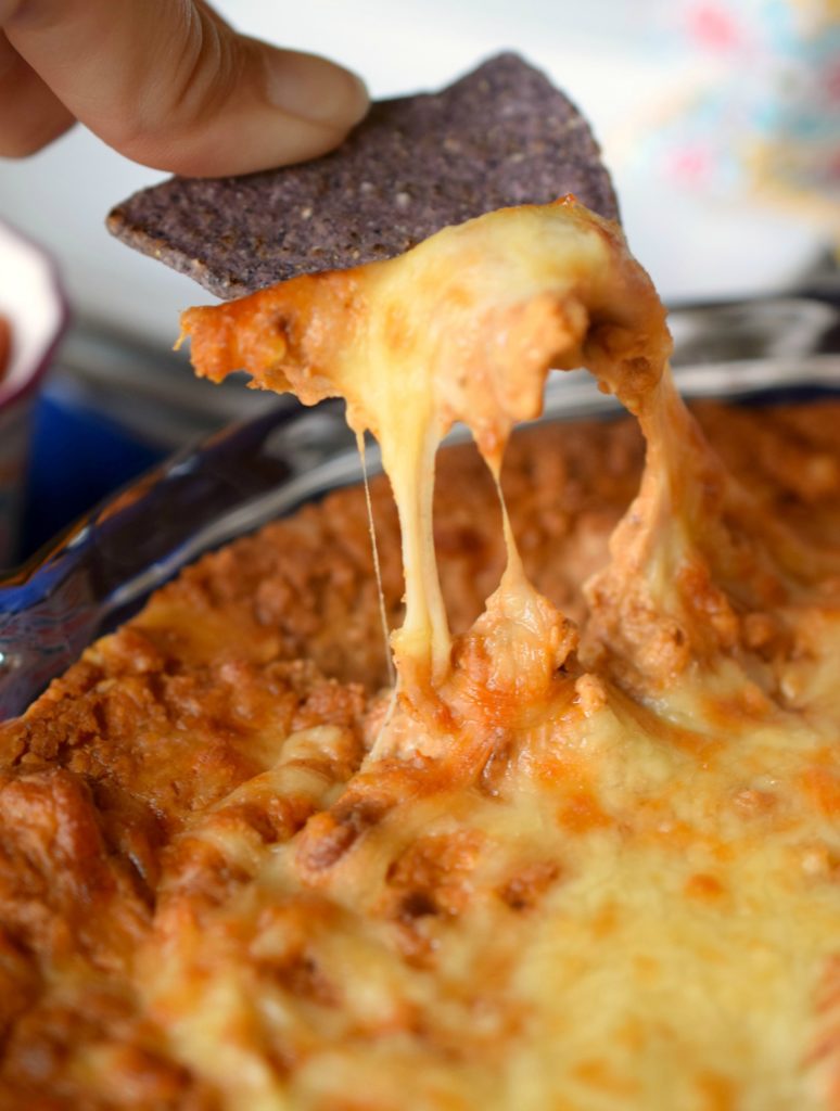 Creamy Chorizo Bean Dip is snap to prepare but delivers delicious flavors worthy of the best tortilla chips. Great appetizer for tailgating or parties too.