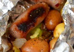 Fire up your grill! Next time you are camping or grilling whip up these easy Brat & Veggie Foil Packet mealls. Simple to make, you'll love the flavors!