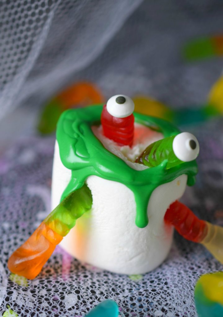 Jumbo marshmallows and gummy worms come alive in Wormy Marshmallow Monsters. This fun and ooey Halloween Treat is a great treat for parties!
