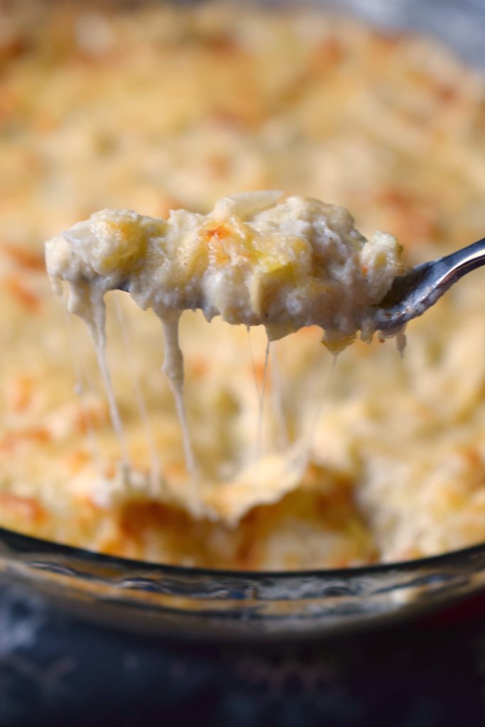 Everyone loves when I make Baked Crab & Artichoke Dip! So simple, loaded with cheese, crab, and chunks of artichoke! Great for holiday parties, just delish!