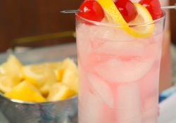 Need an easy summer cocktail? Look no further than the fruity Summer Slammer Cocktail. Whip up a pitcher and enjoy this beverage on a hot summer night!