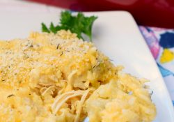 Cheesy Chicken, Artichoke & Rice Casserole is a dish that combines some favorite flavors in one comforting recipe. An easy to prepare dinner you'll love.